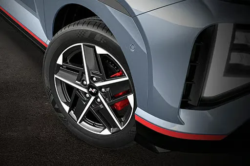 Diamond cut alloy wheel with N emblem